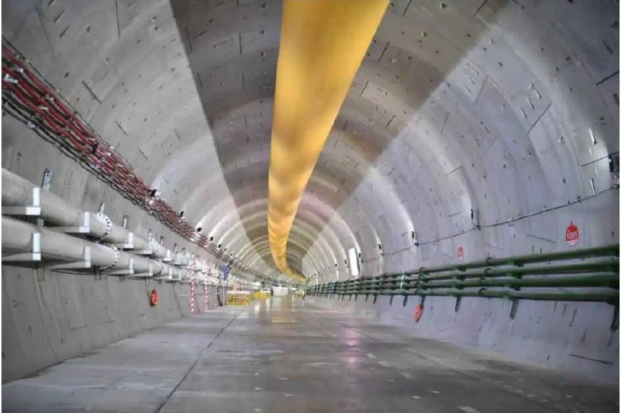 Completed segment-lined interior of the Pearl River Estuary Tunnel under worklights